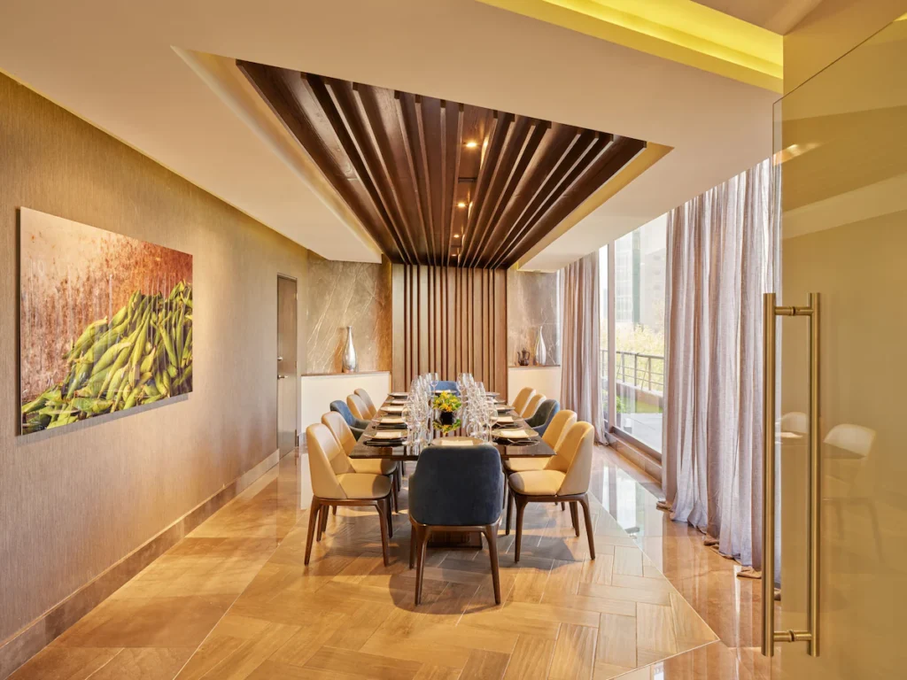Elegant lobby of Fiesta Americana Reforma with marble floors, ambient lighting, and modern seating