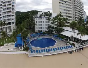 Beachfront hotel in Acapulco’s Golden Zone with ocean-view balconies, outdoor pool, and direct beach access.